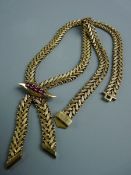 A NINE CARAT GOLD TRIPLE STRAND WOVEN STYLE NECKLACE with a shaped pendant having a row of five