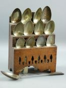 A WELSH FRUIT WOOD THREE TIER SPOON RACK, late 18th/early 19th Century, twelve spoon apertures in