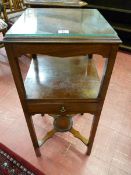 A GEORGIAN MAHOGANY NIGHT STAND, the square top with shaped apron over a central platform with