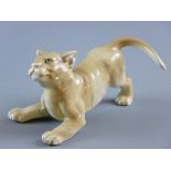 A RARE WADE LION CUB designed by Faust Lang, modelled in playful stance, marked to the foot 'Wade,