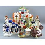 A COLLECTION OF STAFFORDSHIRE POTTERY to include flatback figures, comforter dogs and hen on nest