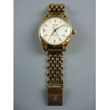 A GENT'S NINE CARAT GOLD ENCASED ROLEX OYSTER PERPETUAL CHRONO WRISTWATCH having a circular dial and