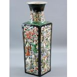 A CHINESE FAMILLE VERT RETICULATED VASE, square section with panels of eighteen immortals amongst