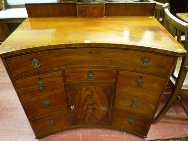 A LATE 19th CENTURY SHERATON STYLE SIDEBOARD, mahogany cross banded and satin wood inlaid of concave