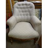 A CIRCA 1880 WALNUT ARMCHAIR, classically re-upholstered with button back and swept arms, well