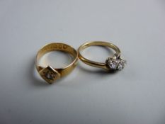 TWO RINGS, a twenty two carat gold signet ring with small centre diamond, 2.6 grms and an eighteen