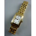 A LADY'S EIGHTEEN CARAT GOLD LONGINES WRISTWATCH having an oblong dial and with a five bar