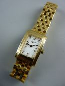 A LADY'S EIGHTEEN CARAT GOLD LONGINES WRISTWATCH having an oblong dial and with a five bar