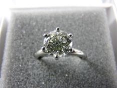 A LADY'S DIAMOND SOLITAIRE RING, platinum set, semi-old cut, 8 x 5 mm, visual estimate 2 carats, H/