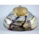 A LOETZ IRIDESCENT GLASS INKWELL having a purple trail work design with brass collar and lid, marked
