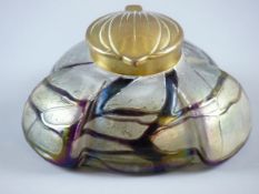 A LOETZ IRIDESCENT GLASS INKWELL having a purple trail work design with brass collar and lid, marked