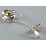 A PAIR OF STYLISH SLIM LADLES, white metal stamped 'I L' and 'A B D', 1.3 ozs, no other visible