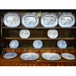 A WILLOW PATTERN DRESSER SET of six meat platters and fourteen dinner plates