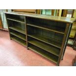 A SOLID OAK BOOKCASE with adjustable interior shelves, panel sided on bun feet and thick gauge