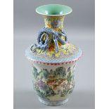 A CHINESE ENAMEL PAINTED PORCELAIN VASE, the flared central body with yellow ground floral