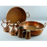 A PARCEL OF COPPERWARE comprising two circular twin handled copper cheese pans, 37 cms and 47 cms