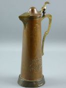 AN ART NOUVEAU CLARET JUG, tall cylindrical body with embossed decoration and with domed lid,