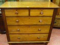 A 19th CENTURY OAK & MAHOGANY CHEST having two short over three long drawers with turned tigerwood