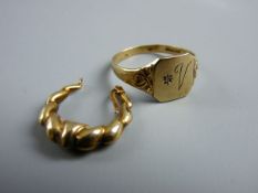 A NINE CARAT GOLD SIGNET RING, 3 grms and a nine carat gold earring from a pair, 1 grm