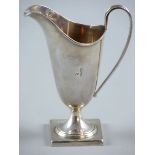 A SQUARE BASED PLAIN SILVER HELMET CREAM JUG, inscribed with the letter 'J', 3.6 ozs, Sheffield