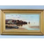 A W BRIGGS oil on board - sunset coastal scene with moored boats and cottages and two figures