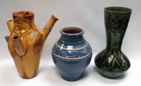 THREE EWENNY POTTERY VESSELS being a rare yellow glazed tri-spouted jug with sgraffito decoration,