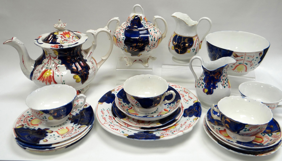 A THIRTY-FIVE PIECE GAUDY WELSH ‘TULIP’ TEA-SET comprising teapot, sugar basin, lidded sucrier,