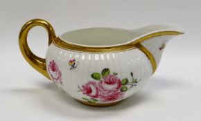 A SWANSEA PORCELAIN MILK JUG of rounded form and of squat proportions with Paris fluted moulding and