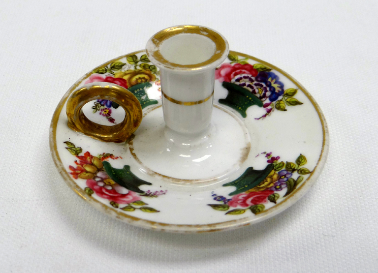 RARE SWANSEA TAPERSTICK with circular stand and cylindrical nozzle, having a gilded ring handle