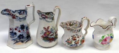 FOUR WELSH POTTERY JUGS comprising South Wales Pottery ‘Bombay’ jug, Nautilus jug by Coombes &
