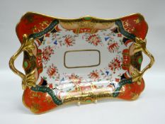 A SWANSEA PORCELAIN ‘TWIG-HANDLED’ DISH in the Japan pattern with gilding, 32cms long