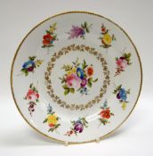 A SWANSEA PORCELAIN DESSERT PLATE finely painted with a series of ten sprigs of colourful flowers to