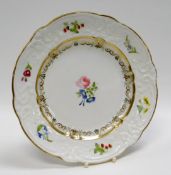 SWANSEA DESSERT PLATE with lobed rim and having a moulded border with C-scrolls, flowers, foliage