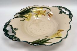 AN EXCEPTIONALLY RARE LLANELLY POTTERY TWIN-HANDLED DISH having moulded handles and crimped rim