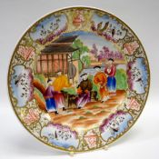 A SWANSEA PORCELAIN ‘MANDARIN’ PLATE of circular form, Swansea in red script to base, 21.5cms diam