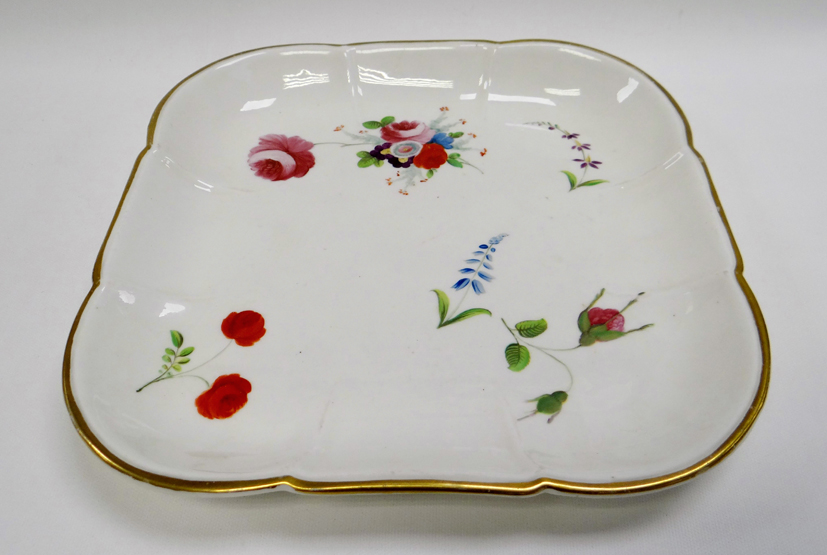 A SWANSEA PORCELAIN SQUARE DISH of rounded and fluted form with gilded rim and painted with - Image 2 of 2