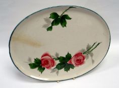 A LLANELLY POTTERY TRAY with painted roses and leaves, ‘LLANELLY ART POTTERY’ printed mark to