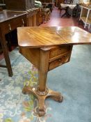 A VICTORIAN WALNUT SEWING TABLE with foldover swivel top, twin opening side drawers on a segmented