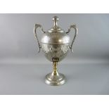 A VICTORIAN TEA SAMOVAR in a pewter tone with bright cut and reeded decoration, twin handled with