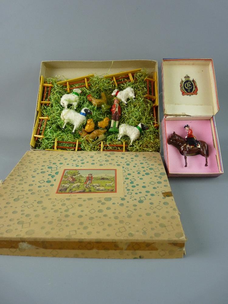 A DIECAST CORONATION MODEL of the Queen on horseback, formed in two parts (unknown maker), in