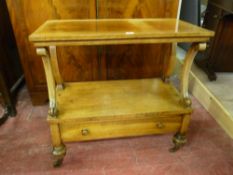 A TWO SHELF WALNUT WHATNOT with lower drawer, shaped and carved shell supports on turned feet with