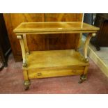 A TWO SHELF WALNUT WHATNOT with lower drawer, shaped and carved shell supports on turned feet with