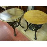 TWO VICTORIAN CAST IRON TAVERN TABLES by Gaskell & Chambers Ltd, Bar Fitters, circular wooden tops