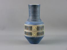 A TROIKA POTTERY URN SHAPED VASE having central geometric bands on a textured blue ground, marked to