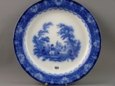 A LARGE DOULTON BURSLEM FLOW BLUE PLATE in 'Watteau' pattern, 37.5 cms diameter, transfer