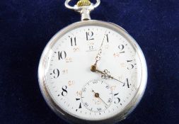 AN OMEGA OPEN FACED POCKET WATCH, the white dial marked 'Omega' with Arabic numerals and painted