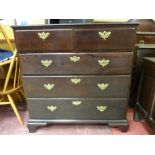 A LATE 18th/EARLY 19th CENTURY MAHOGANY CHEST of two short over three long drawers, crossbanded edge