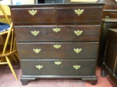 A LATE 18th/EARLY 19th CENTURY MAHOGANY CHEST of two short over three long drawers, crossbanded edge