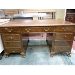 EARLY 20th CENTURY TWIN PEDESTAL MAHOGANY DESK, the top with gadrooned border and the four drawer