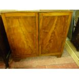 A GEORGIAN MAHOGANY PRESS CUPBOARD TOP recently used as a plan chest with four deep slide-out
